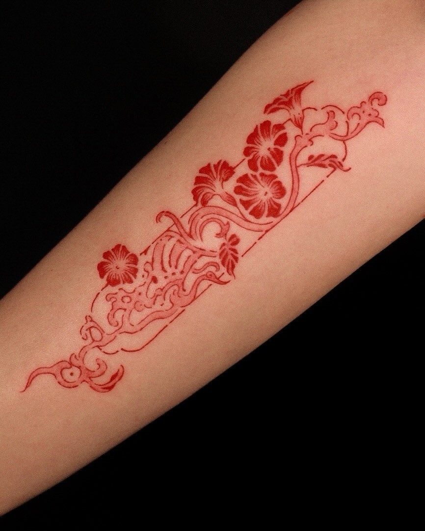Intricate red ink eye tattoo design Tattoo Design