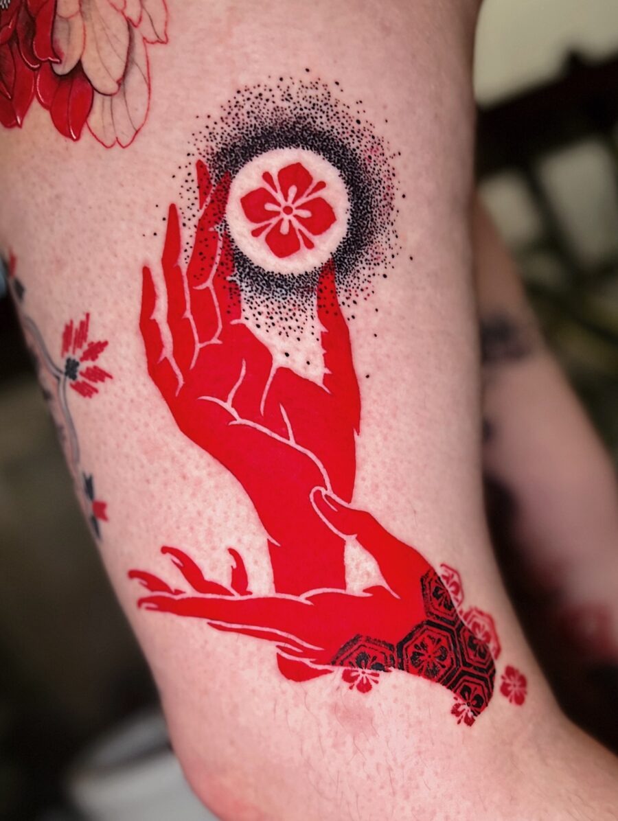 Intricate red ink snake tattoo design Tattoo Design