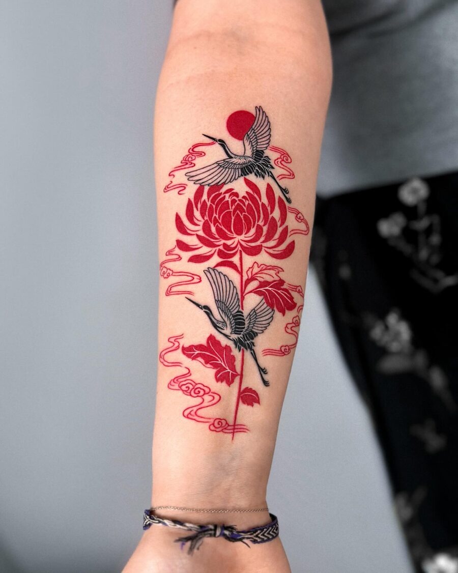 Intricate red ink snake tattoo on forearm Tattoo Design