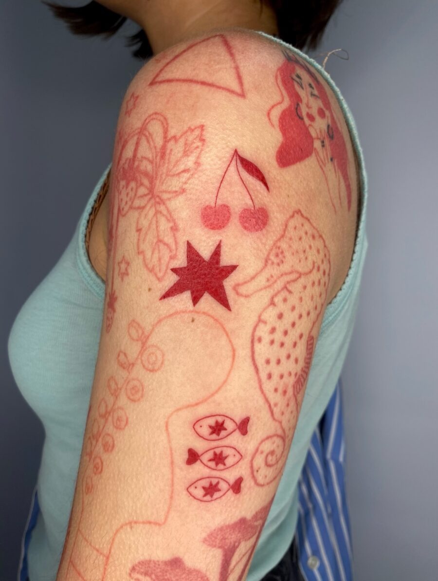 Striking red ink peacock tattoo design Tattoo Design