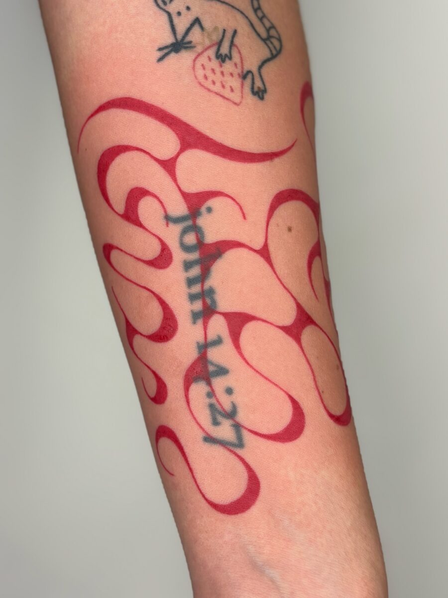 Striking Red Ink Tattoo Back Artwork Tattoo Design