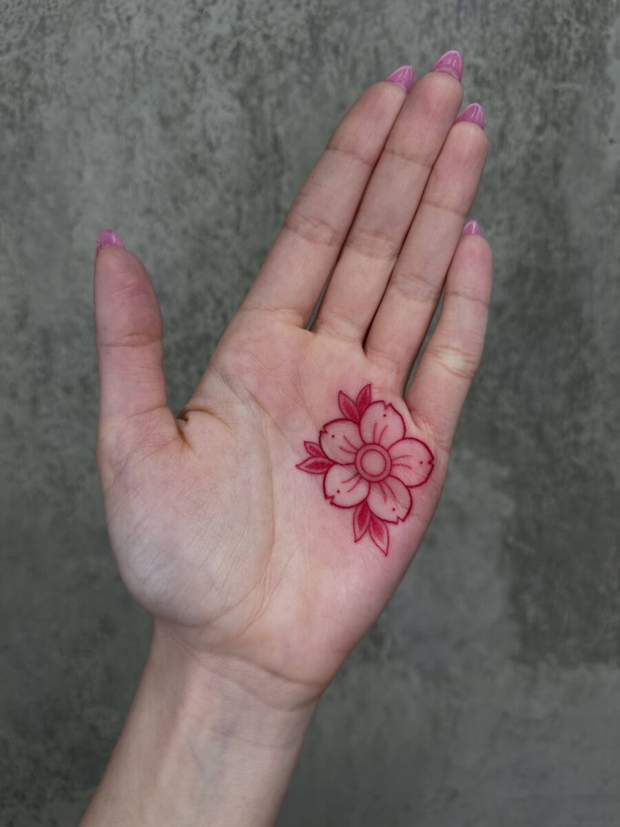 Striking Red Ink Tattoo Design on Shoulder Tattoo Design