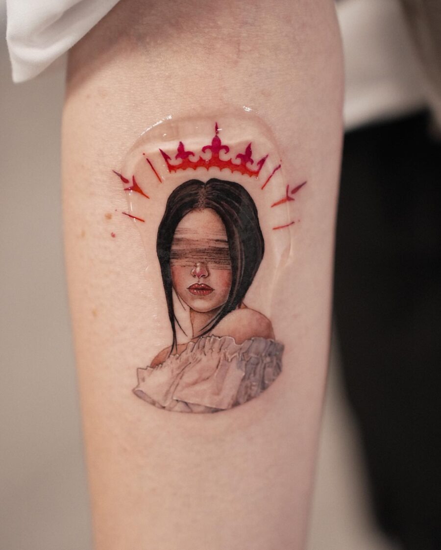 Striking red ink tattoo with floral elements Tattoo Design