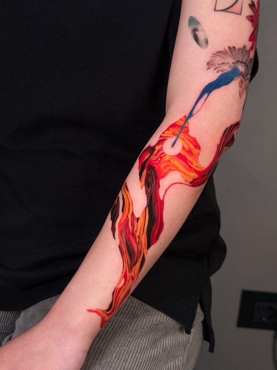 Stunning red flower tattoo bringing life. Tattoo Design