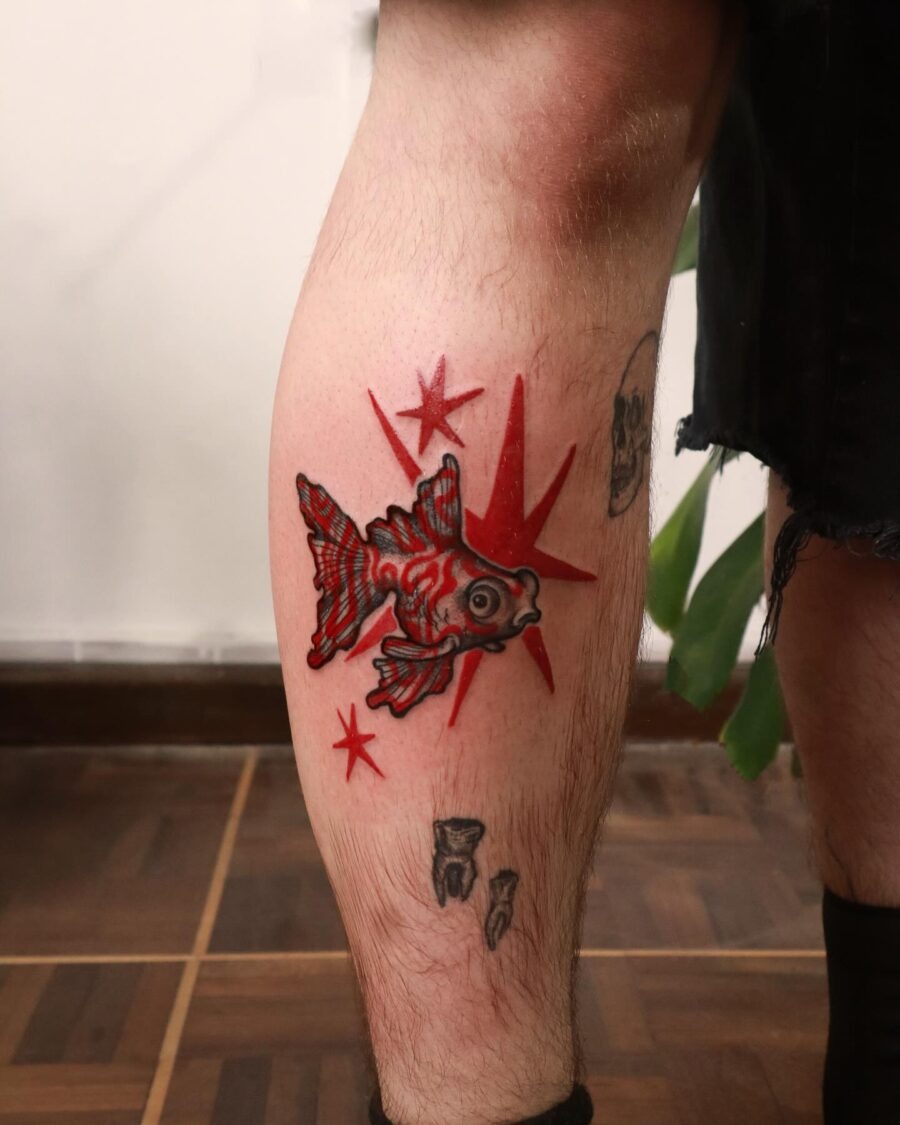 Stunning red ink floral tattoo on arm Tattoo Design