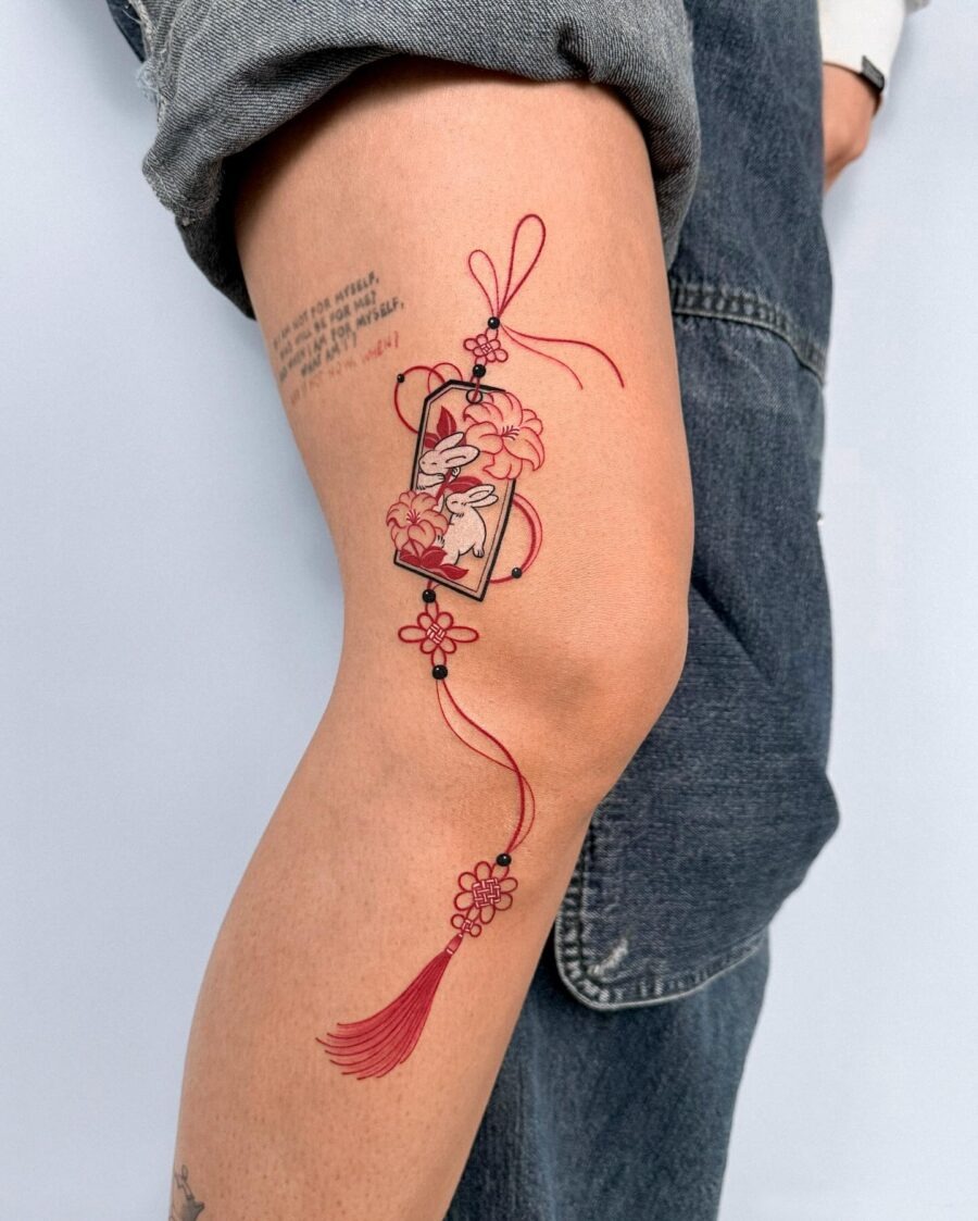 Unique Red Ink Text Tattoo on Shoulder Tattoo Design