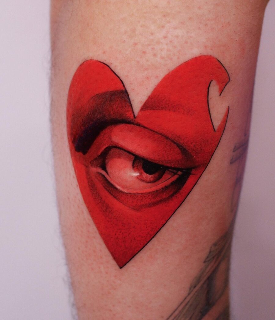 Vibrant Red Ink Bird Tattoo on Forearm Tattoo Design