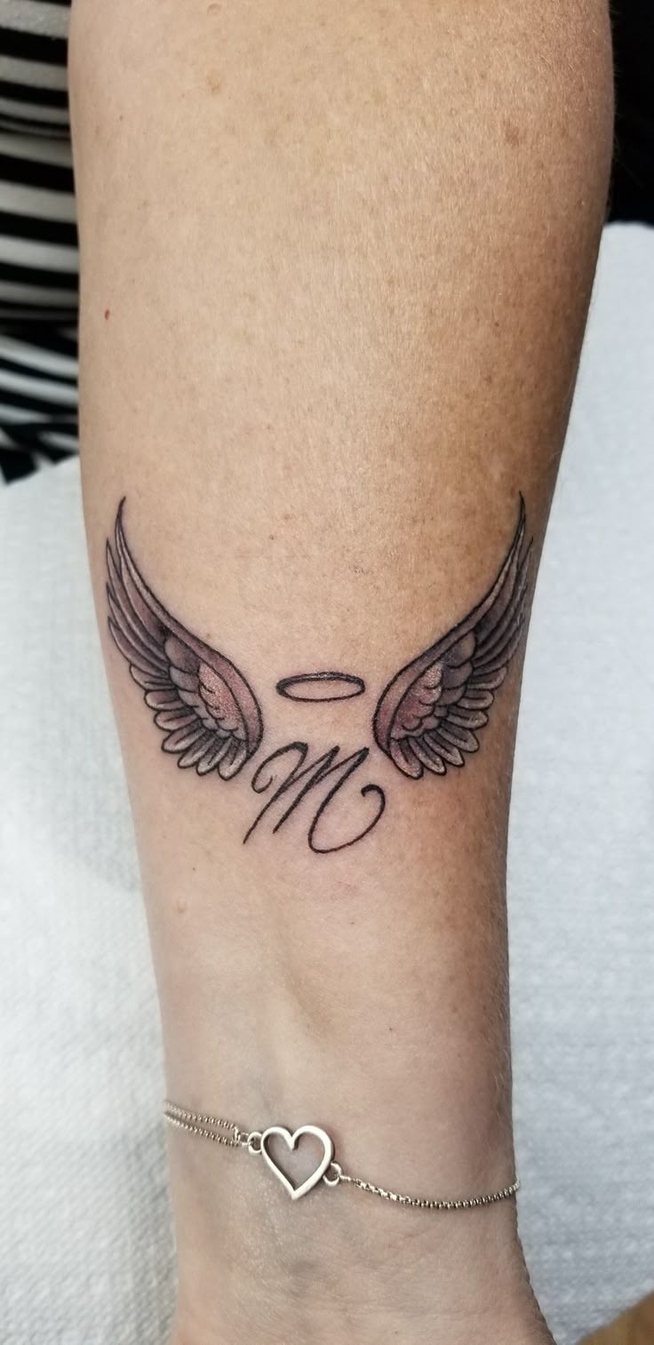 Minimal Wings with M Initial Tattoo Design