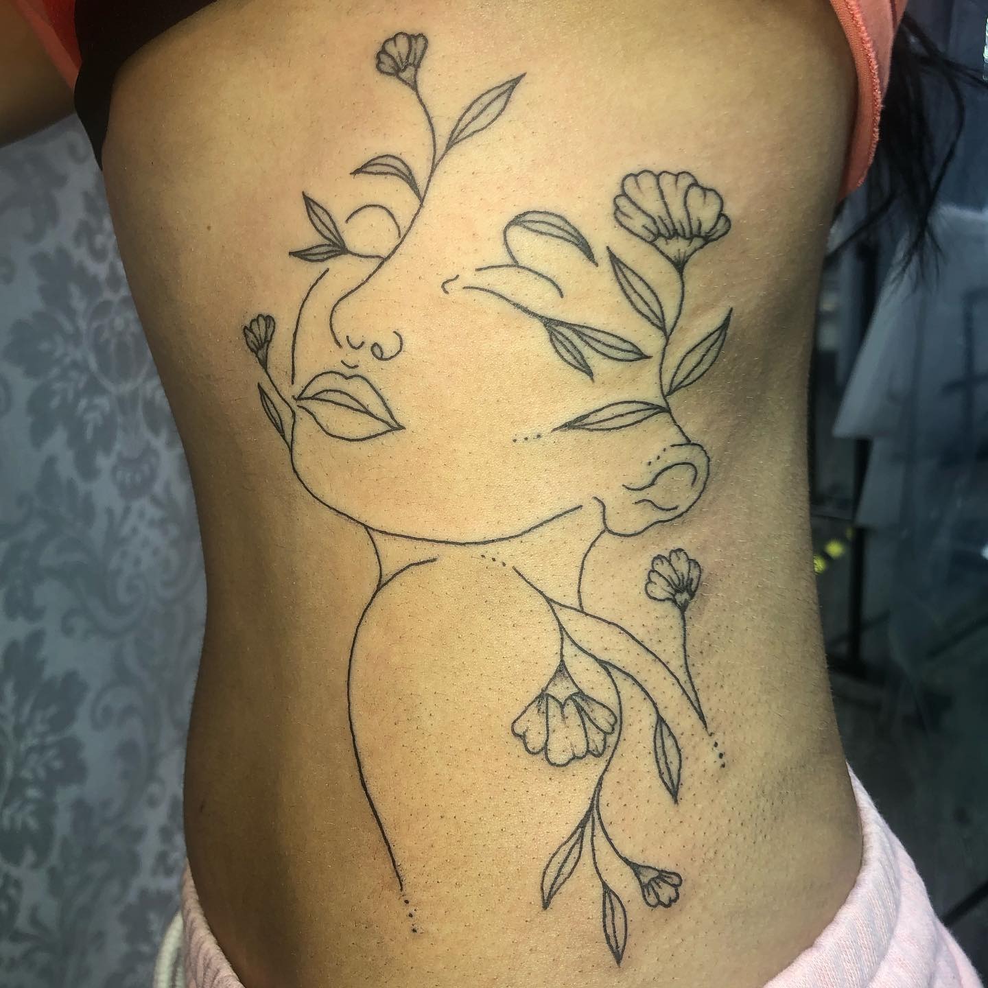 Floral Woman Face Rib Tattoo Tattoo Design
