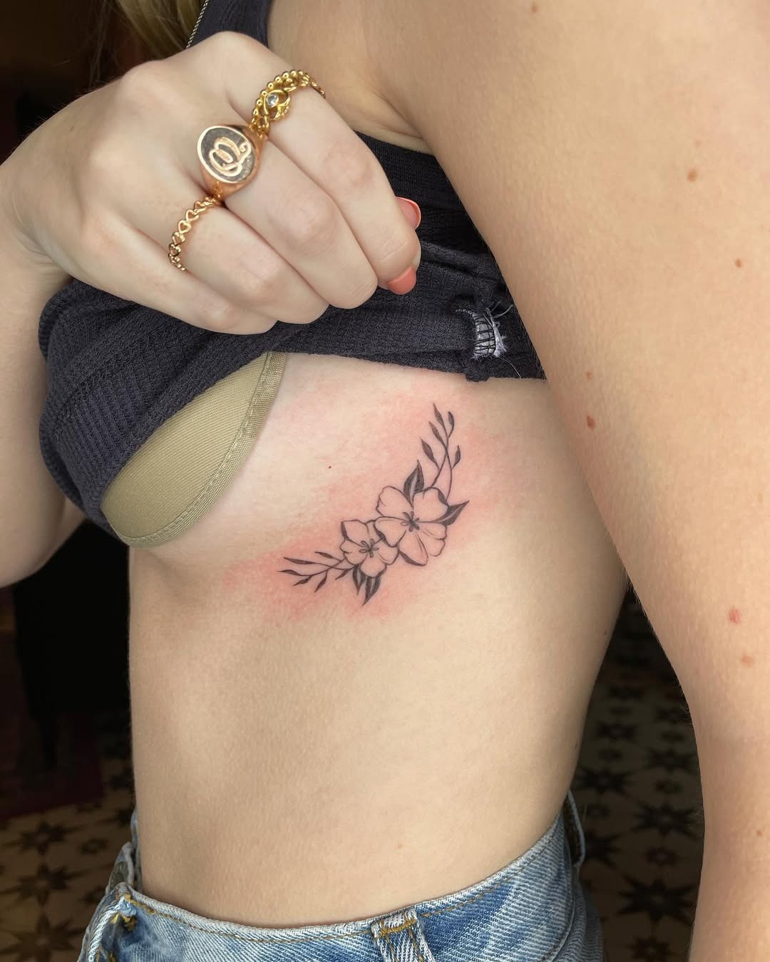 Elegant Floral Rib Tattoo Design for Women Tattoo Design