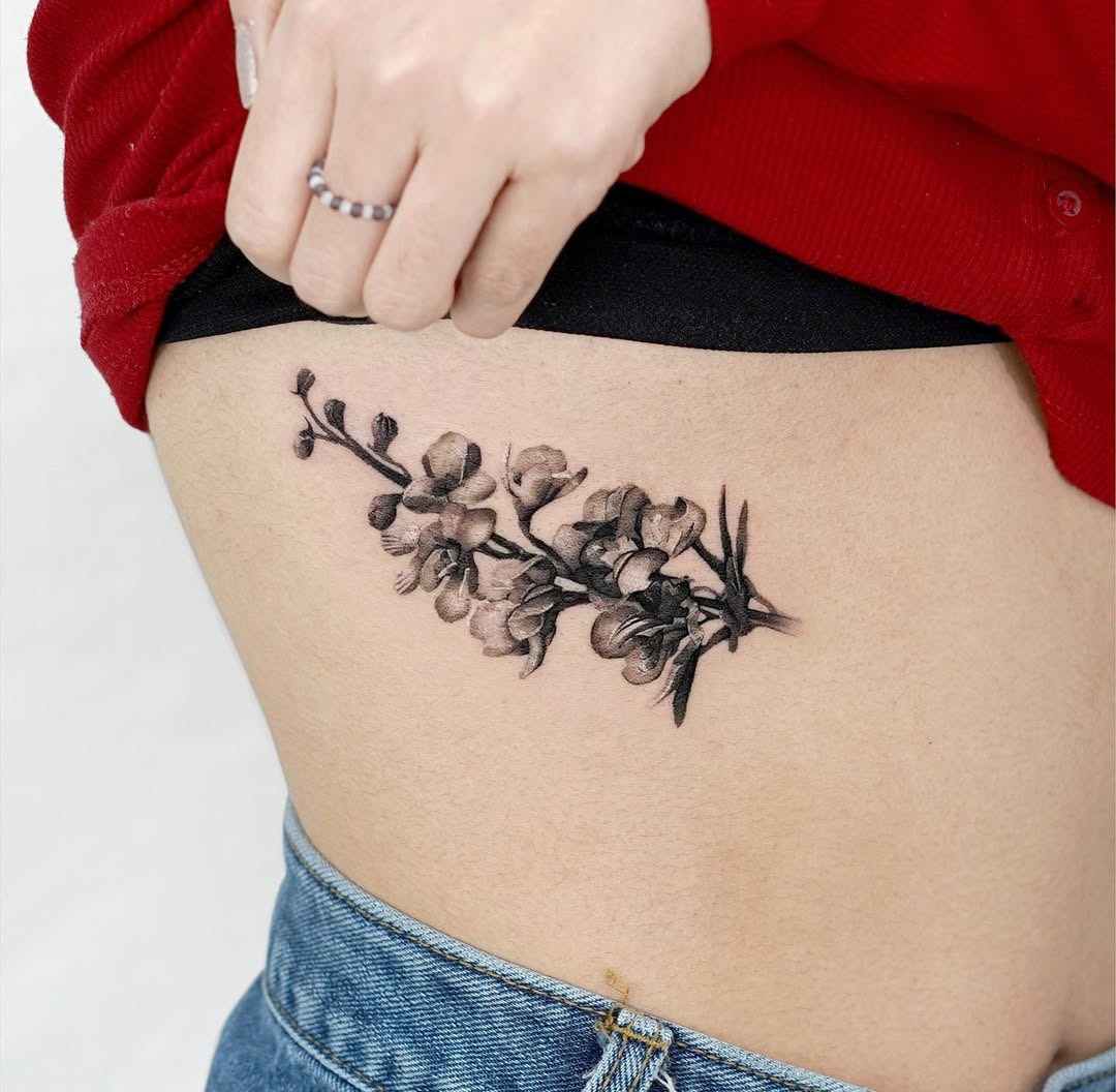 Elegant Floral Rib Tattoo for Body Art Tattoo Design