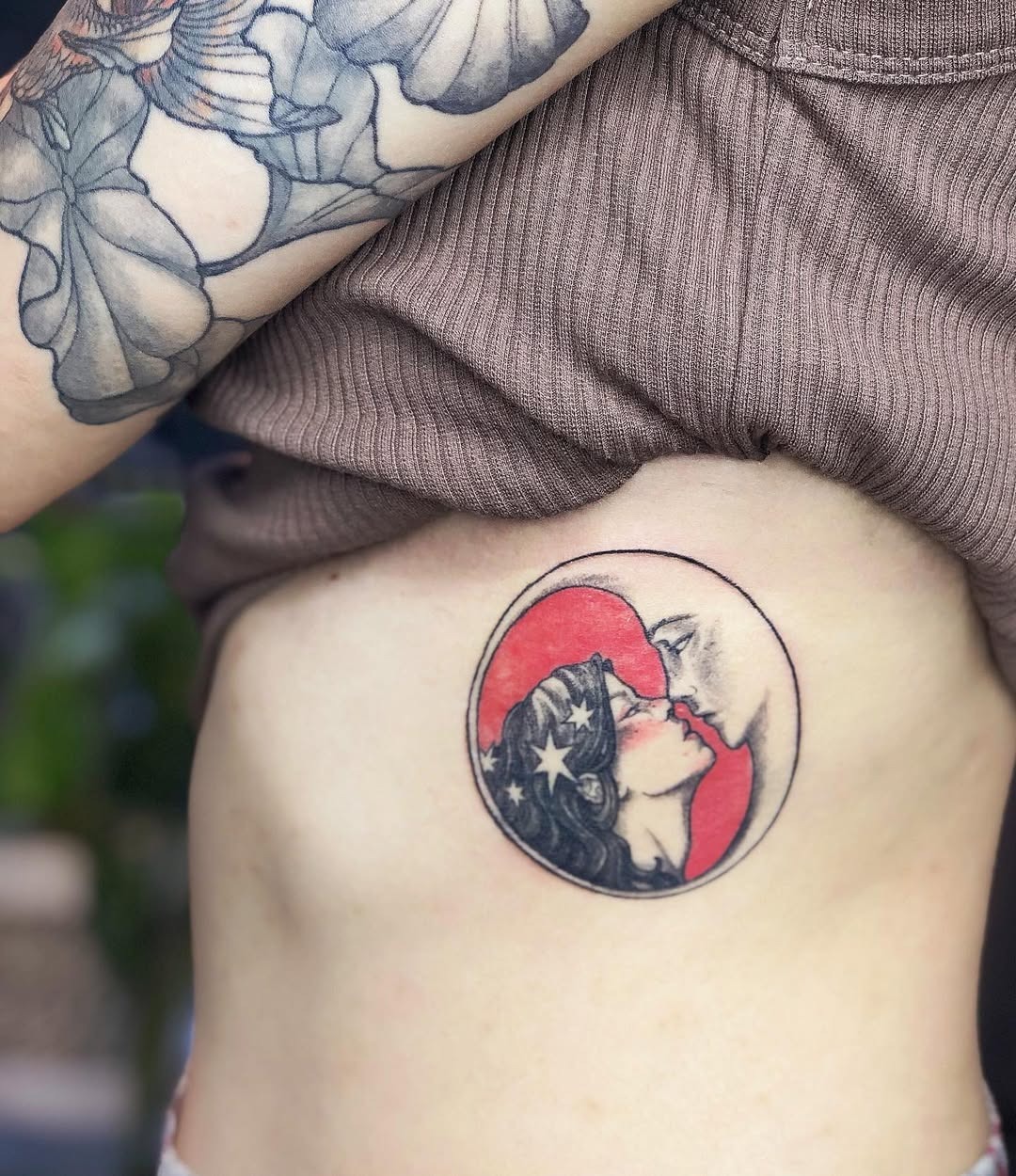 Romantic Rib Tattoo Featuring Moon and Kiss Tattoo Design