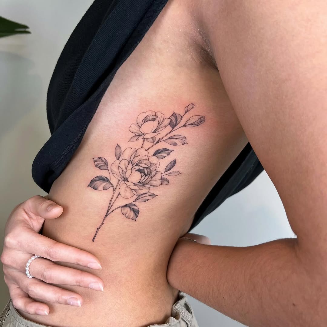 Stunning Floral Rib Tattoo Design for Inspiration Tattoo Design