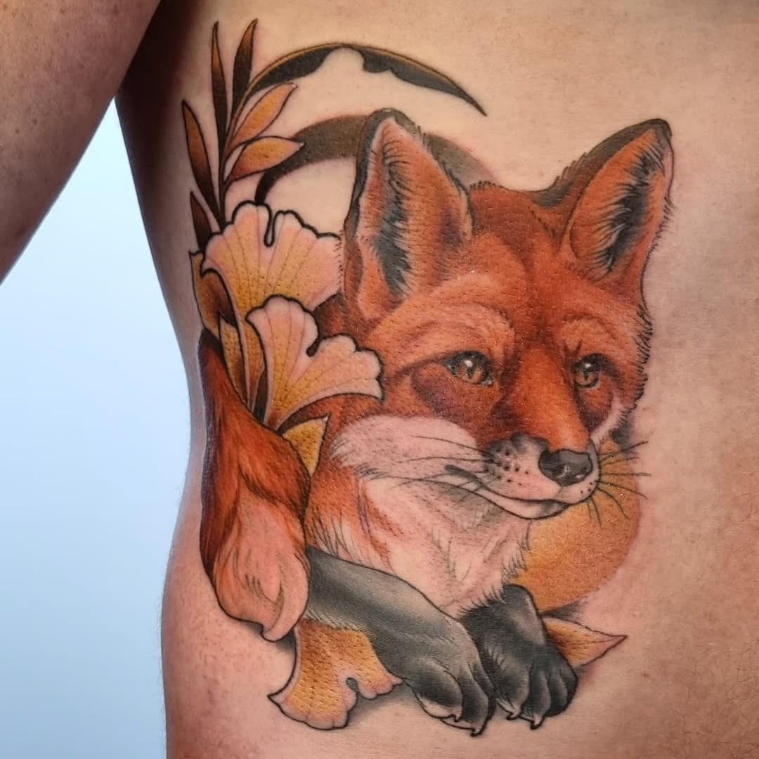 Stunning Fox Rib Tattoo with Floral Elements Tattoo Design