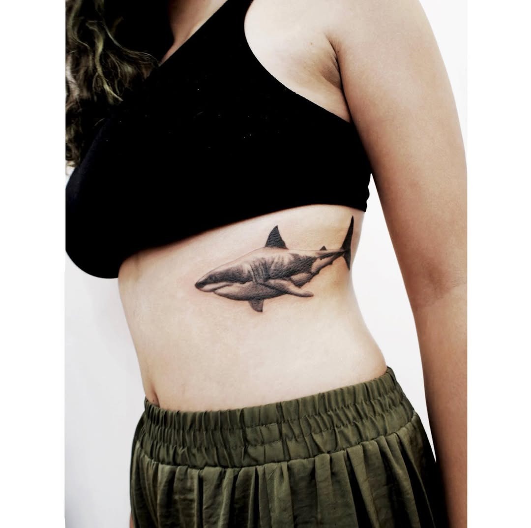 Stunning Rib Tattoo of a Majestic Shark Tattoo Design