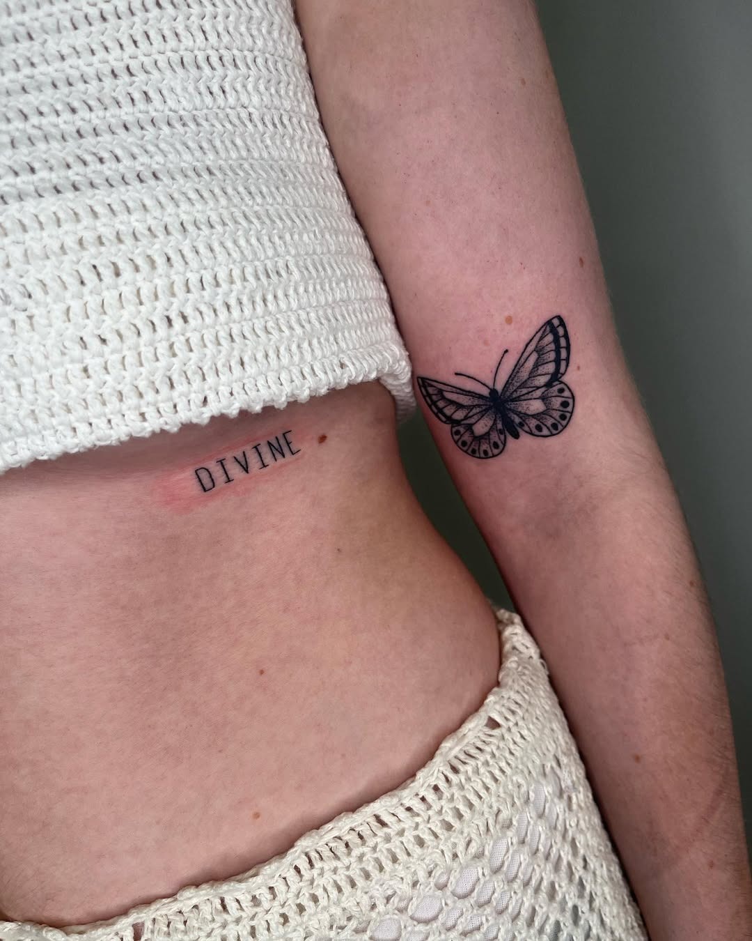 Stunning Rib Tattoo with Butterfly Design Tattoo Design