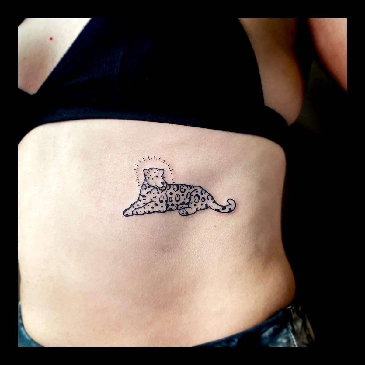 Resting Leopard Rib Tattoo Tattoo Design
