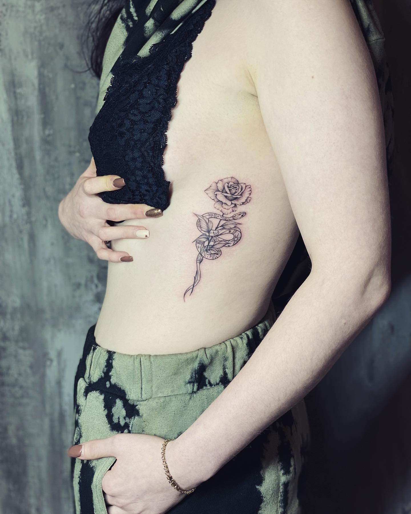 Rose and Coiled Snake Rib Tattoo Tattoo Design