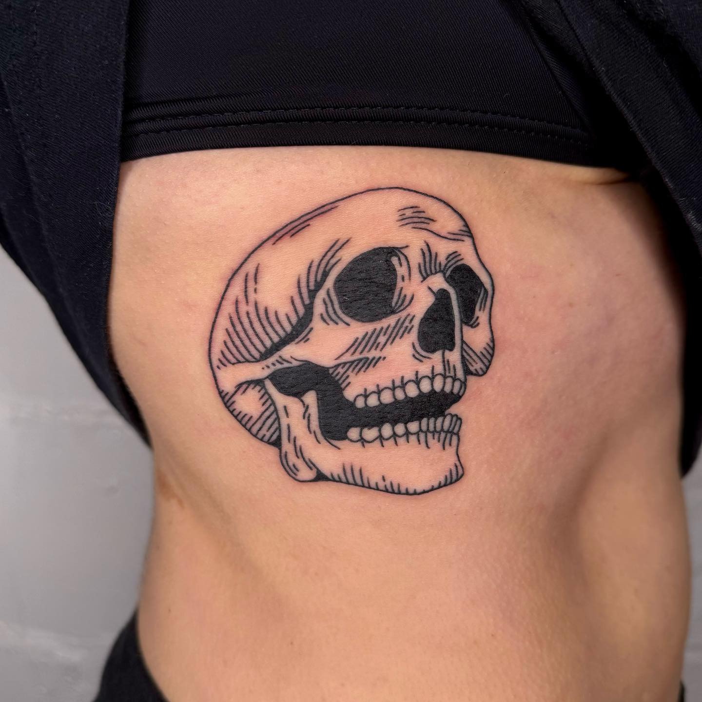Traditional Skull Rib Tattoo Tattoo Design