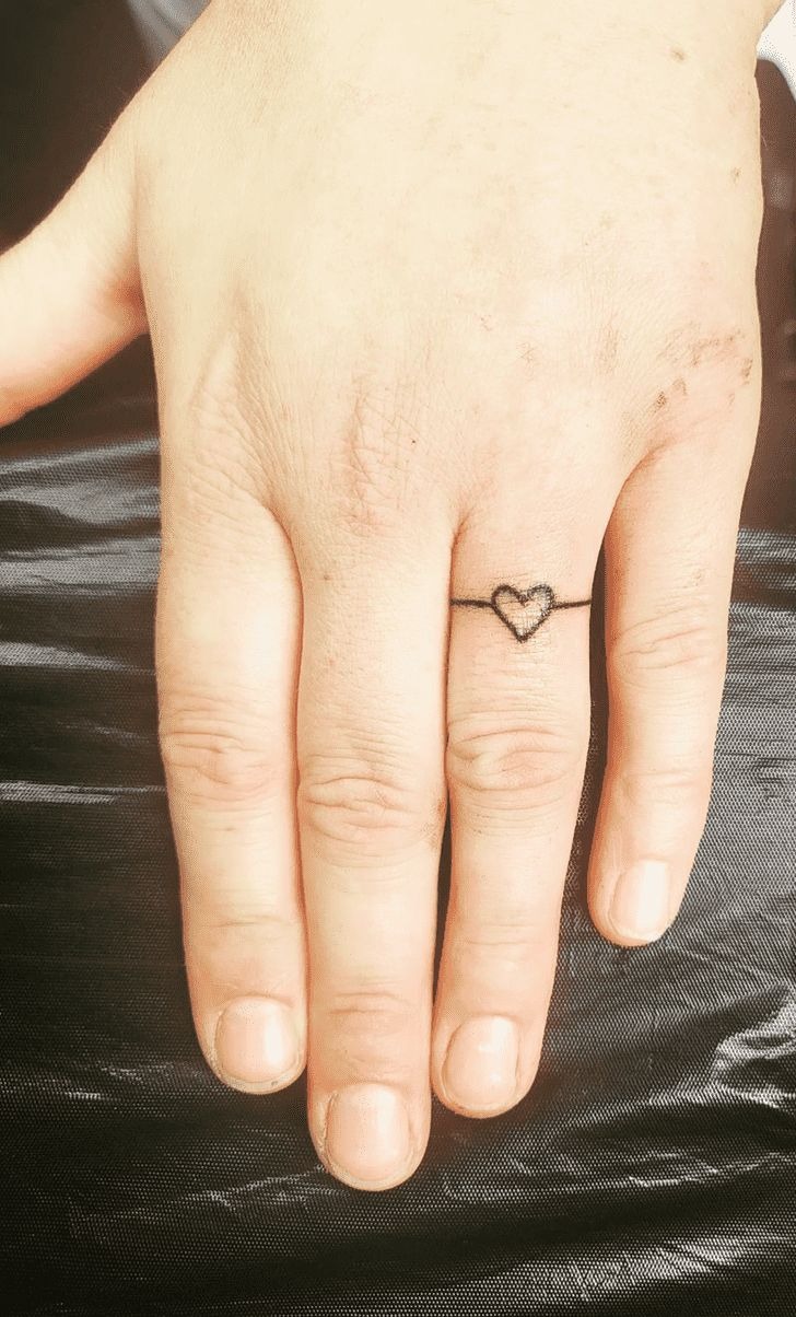 Arrow-Inspired Ring Tattoo Tattoo Design