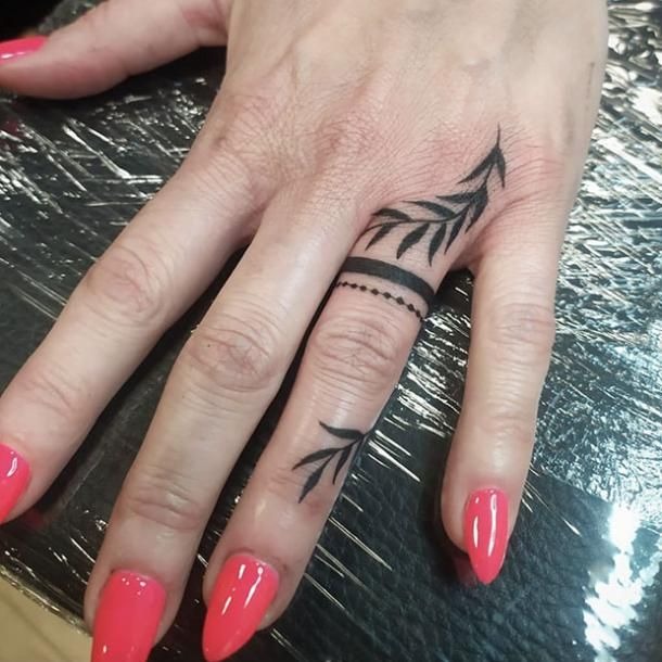 Star-Inspired Wedding Ring Tattoo Tattoo Design