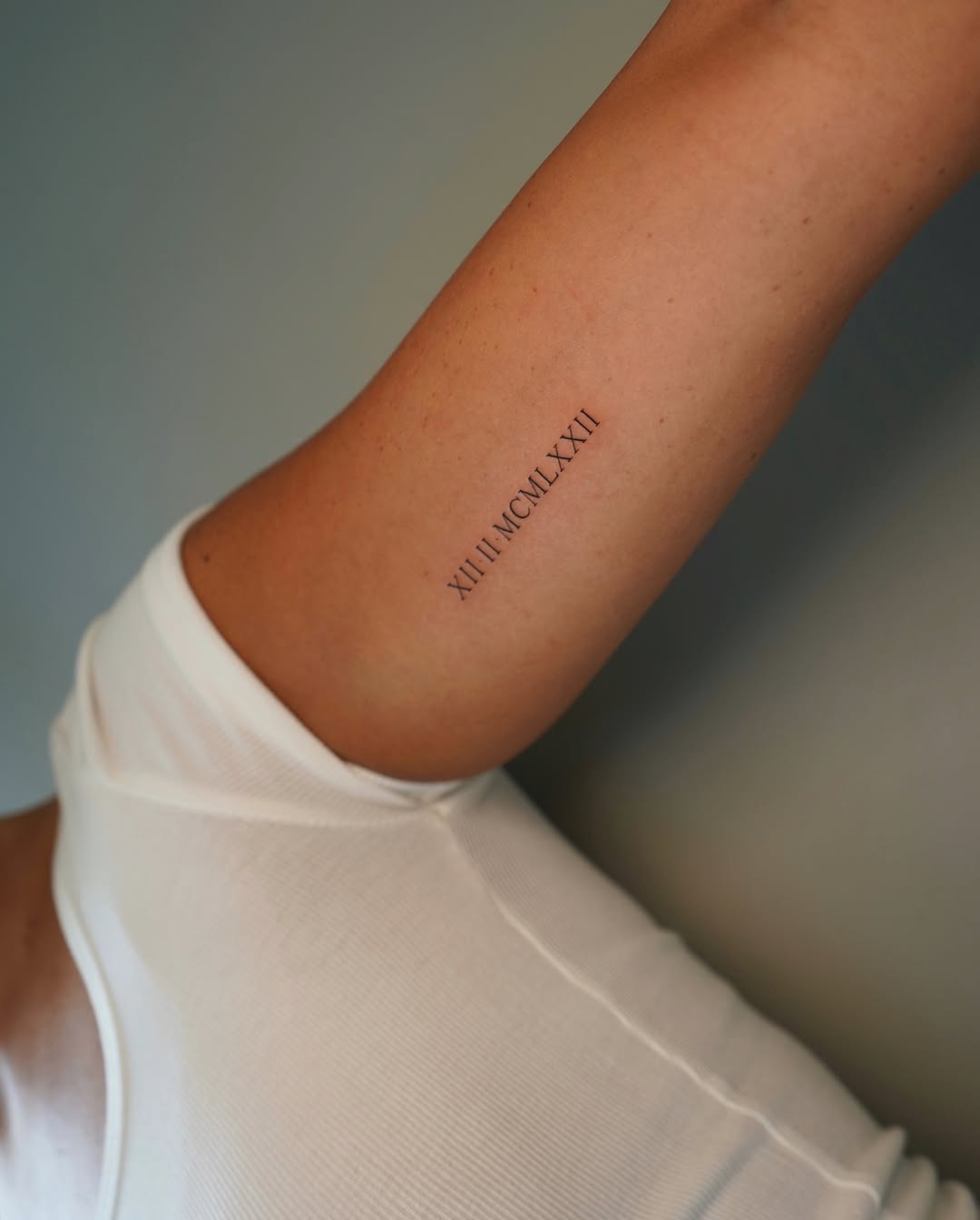 Stylish Roman Numeral Tattoo on Forearm Tattoo Design