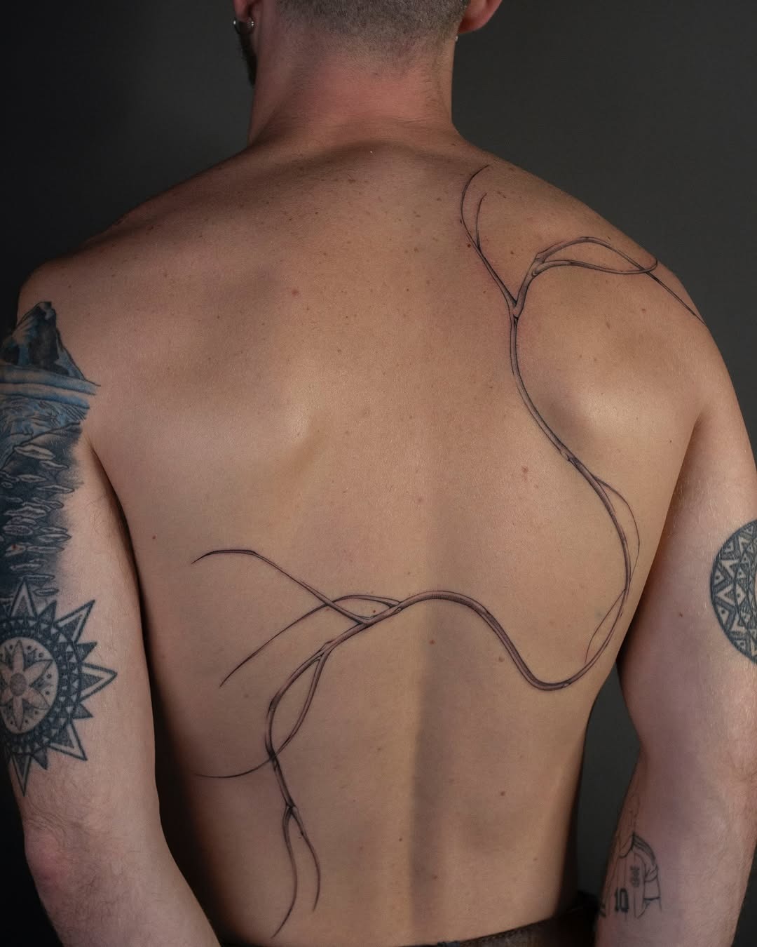 Elegant roots tattoo embodying nature's connection Tattoo Design