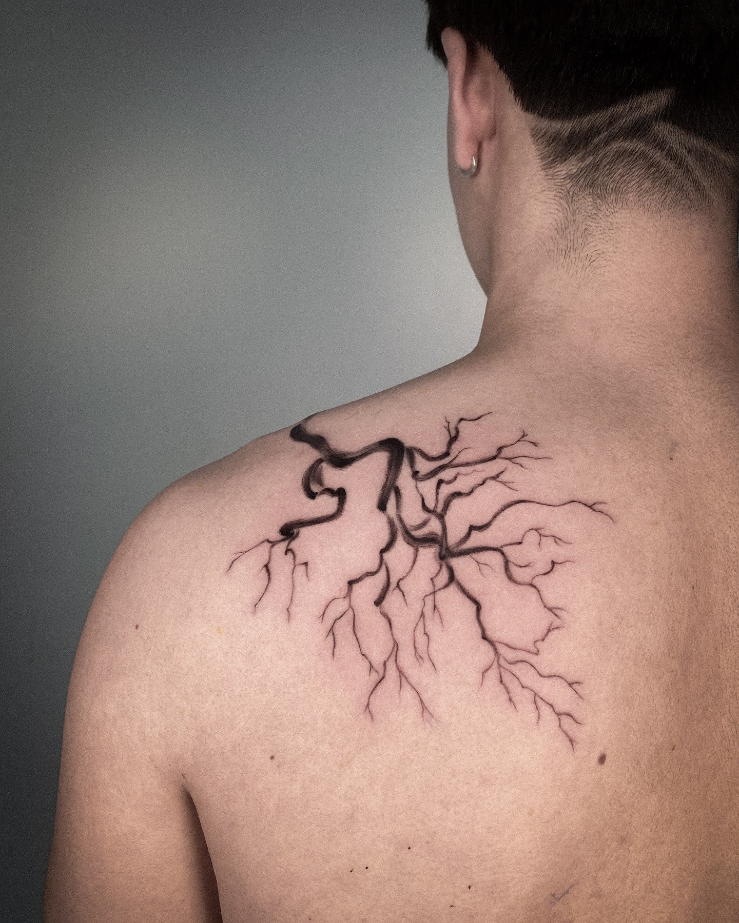 Intricate Roots Tattoo on Back Shoulder Tattoo Design
