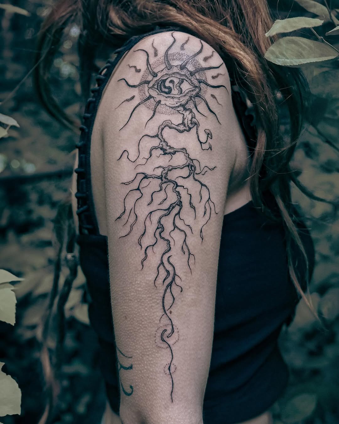 Stunning roots tattoo with a sun motif Tattoo Design