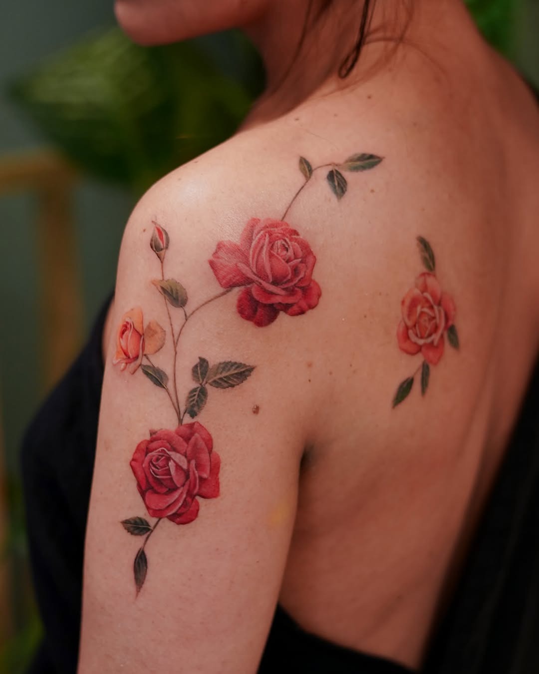 Beautiful roses in vibrant shades on skin Tattoo Design