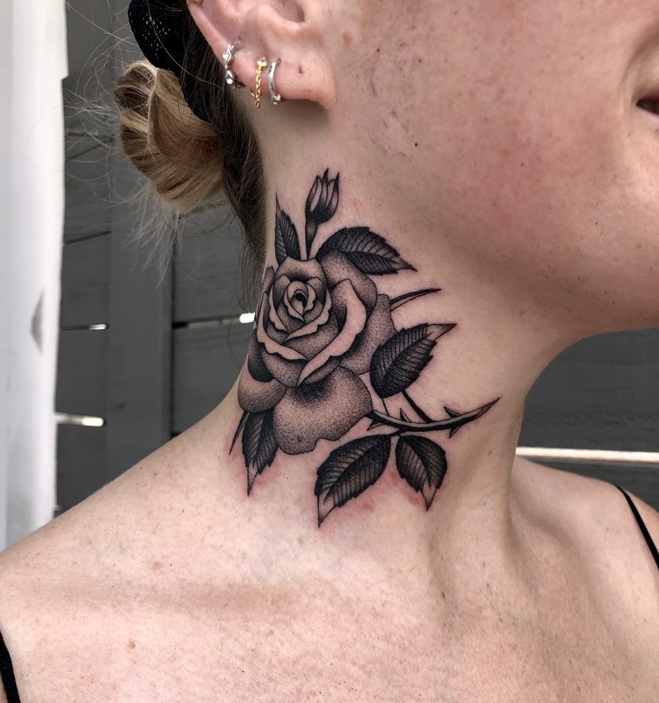 Elegant neck rose tattoo with intricate shading Tattoo Design