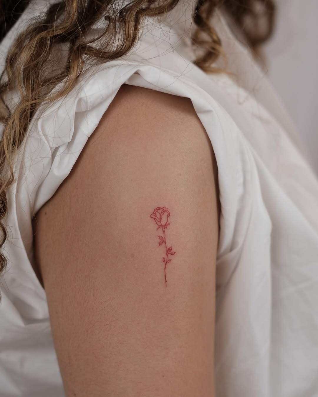 Elegant rose tattoo for a subtle statement Tattoo Design