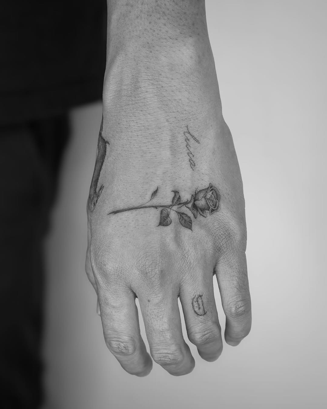 Elegant rose tattoo on a hand Tattoo Design