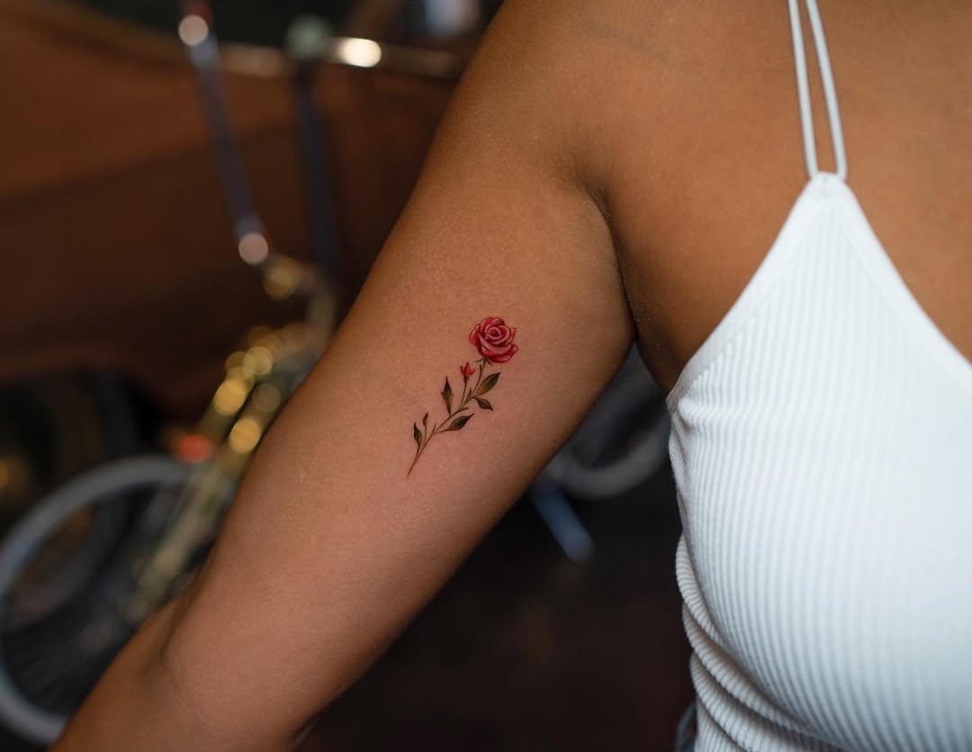 Elegant rose tattoo on the arm Tattoo Design