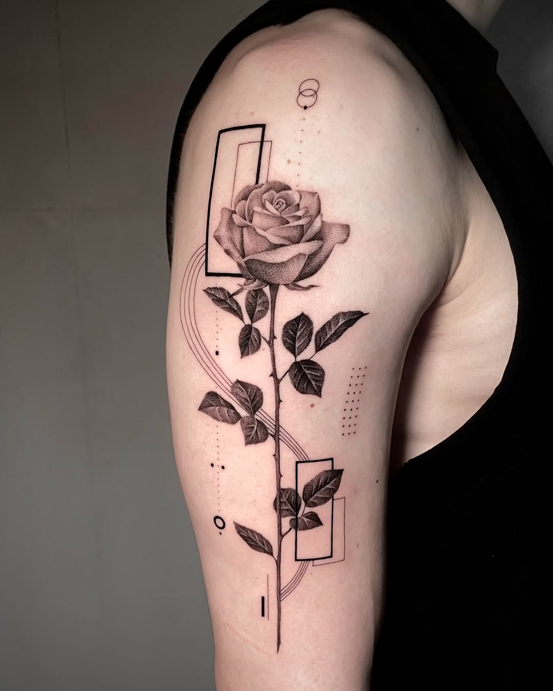 Elegant rose tattoo with geometric elements Tattoo Design