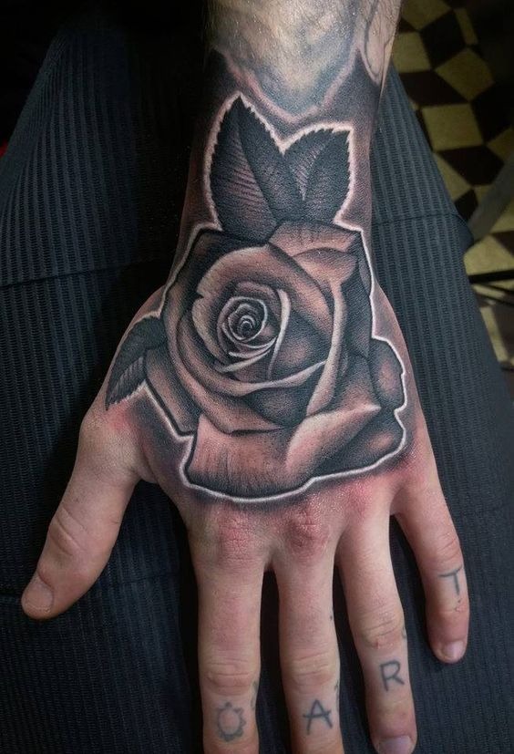Bold Black Rose Hand Tattoo Tattoo Design