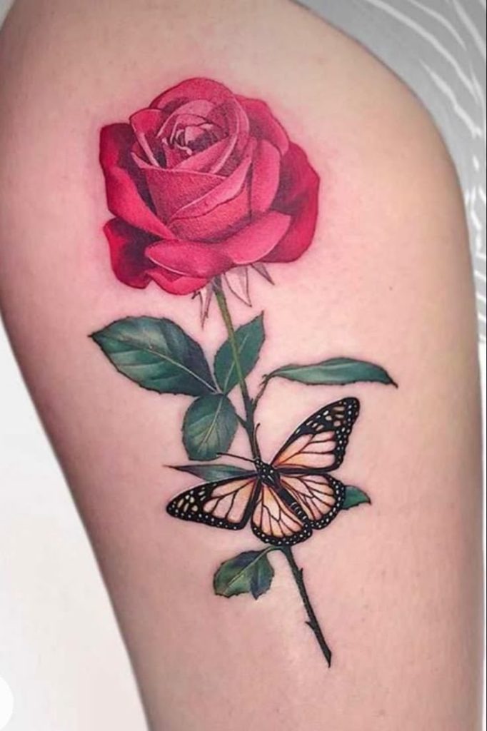 Hyper-realistic rose with butterfly accent Tattoo Design