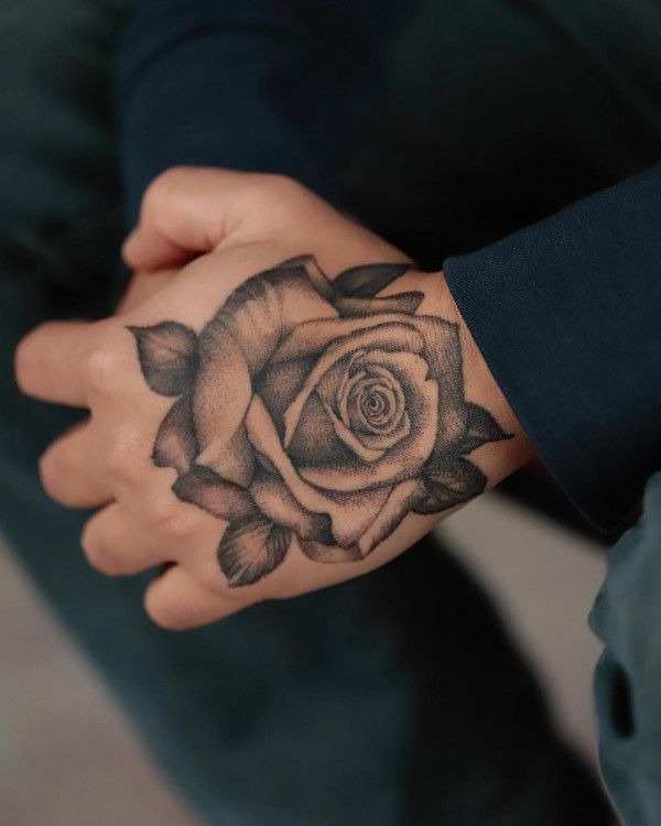 Ornate black rose handpiece Tattoo Design
