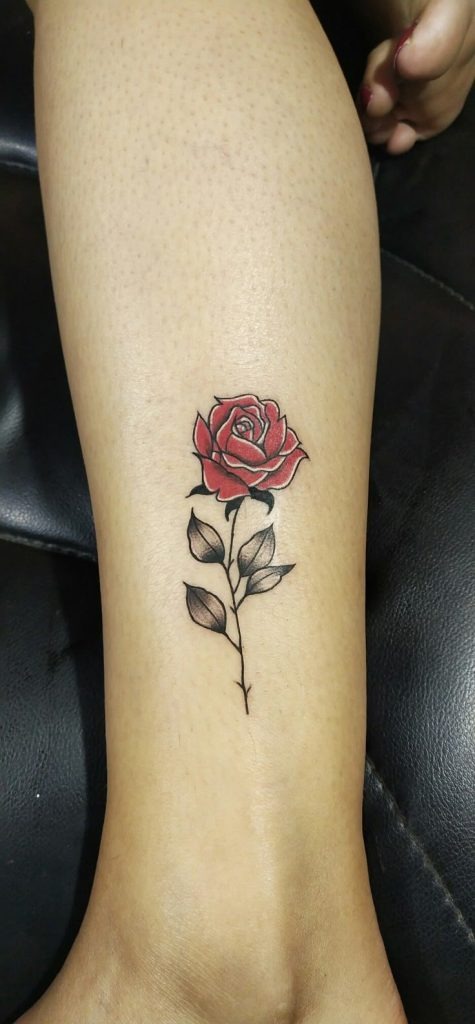 Petite perfection with classic red Tattoo Design