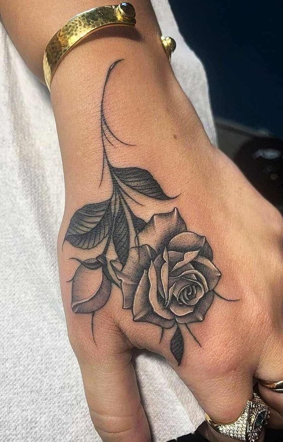 Refined and romantic handpiece Tattoo Design