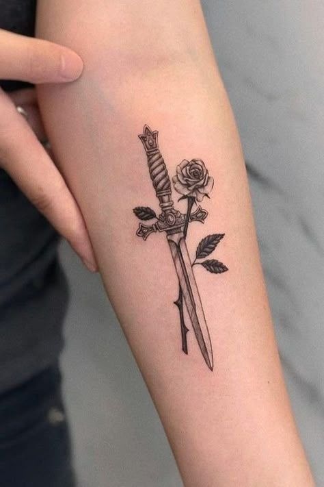 Rose and Dagger: Elegant yet fierce Tattoo Design