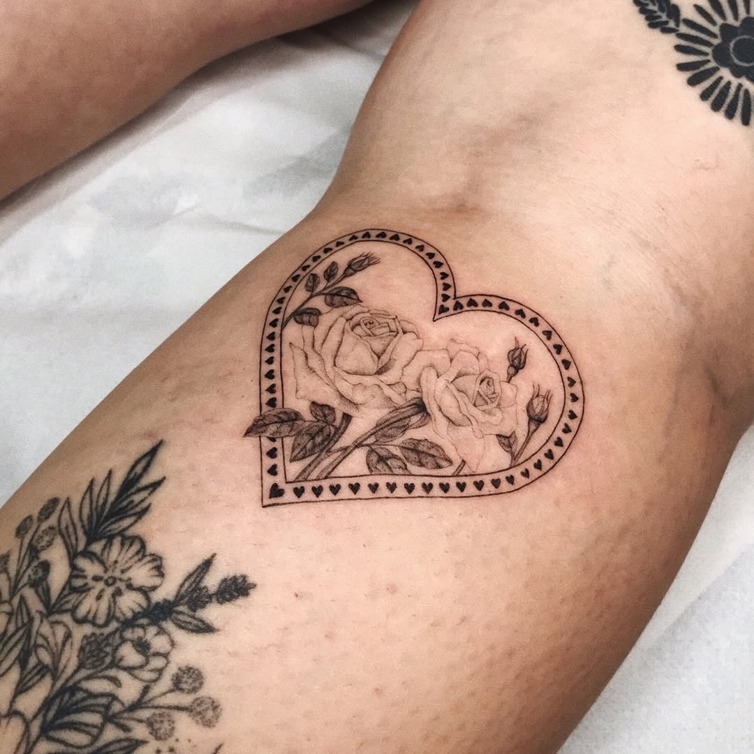 Heart-shaped rose tattoo with intricate details Tattoo Design