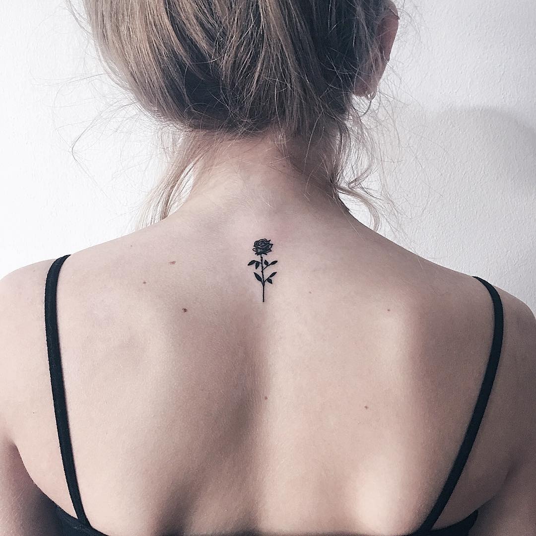 Minimalist rose tattoo on the back Tattoo Design