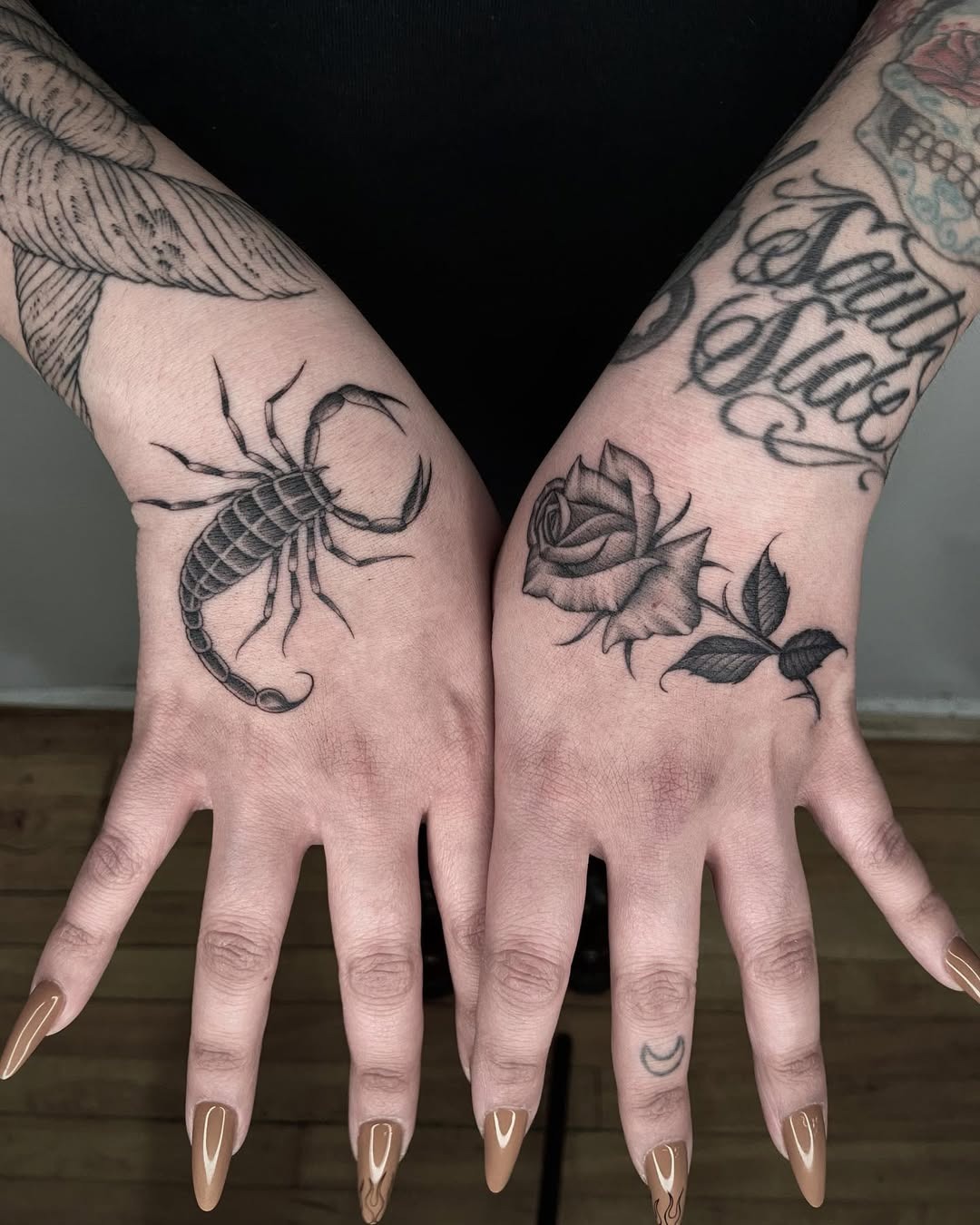 Scorpion and rose tattoo on hands Tattoo Design