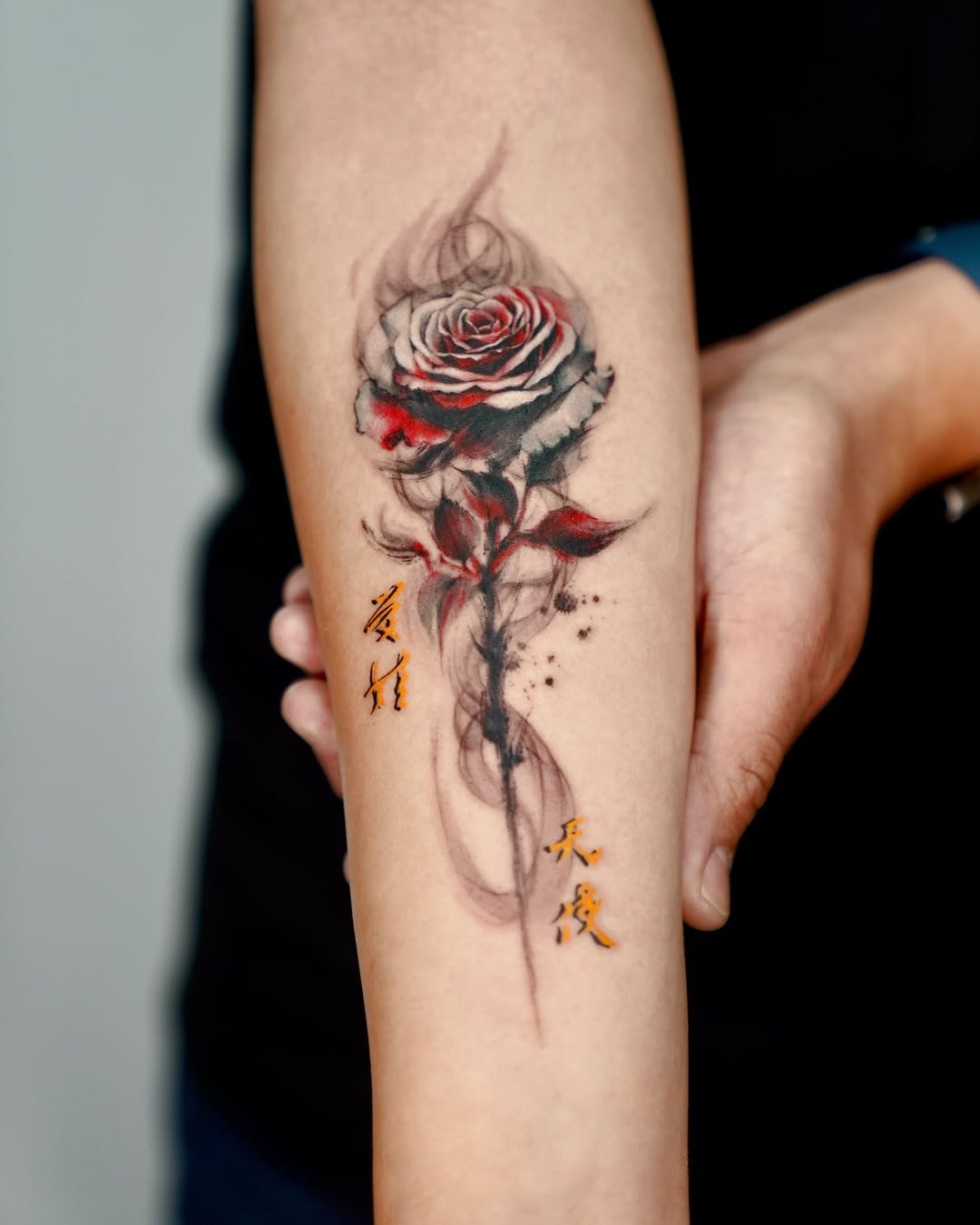 Striking rose tattoo with artistic flair Tattoo Design