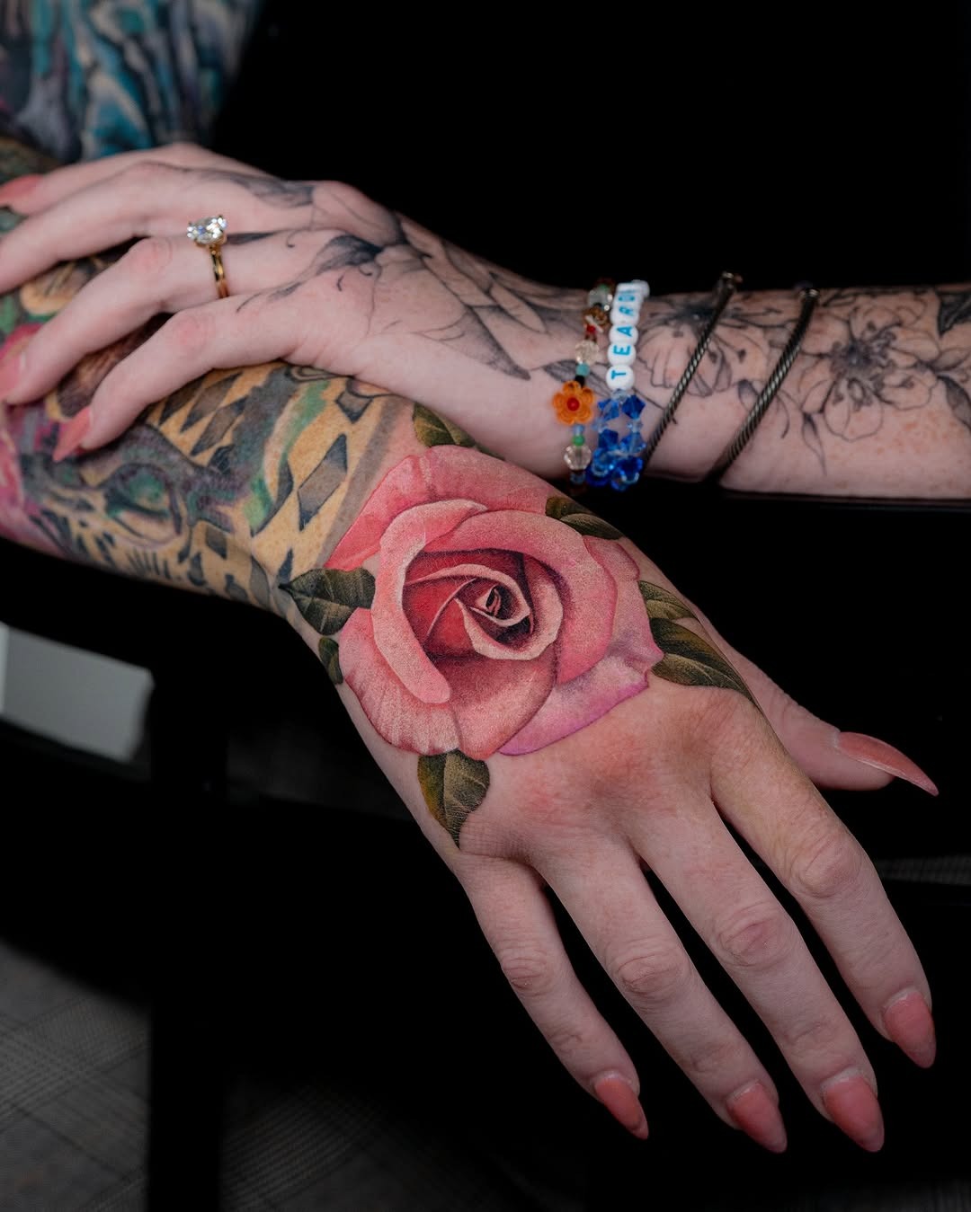 Stunning rose tattoo gracefully adorning the hand Tattoo Design