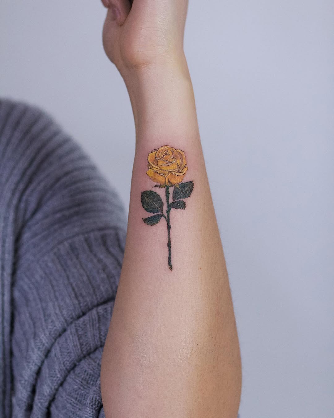 Stunning yellow rose tattoo on forearm. Tattoo Design