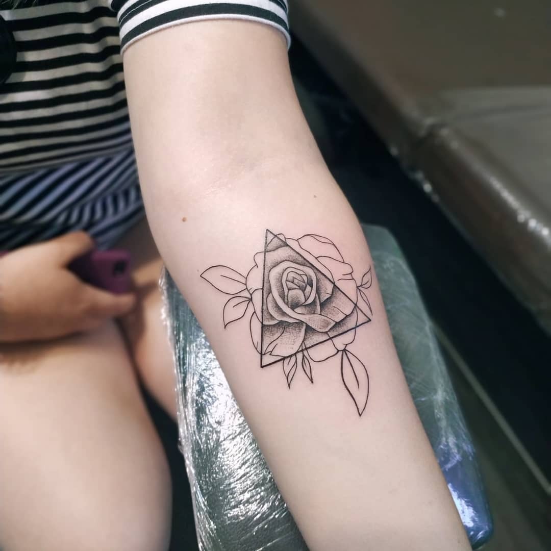 Stylish rose tattoo with geometric flair Tattoo Design