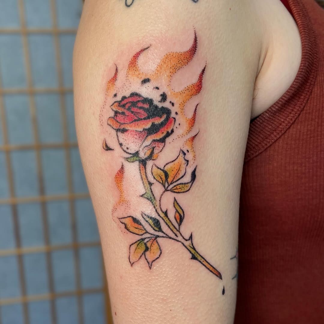 Vibrant rose tattoo wrapped in flames Tattoo Design