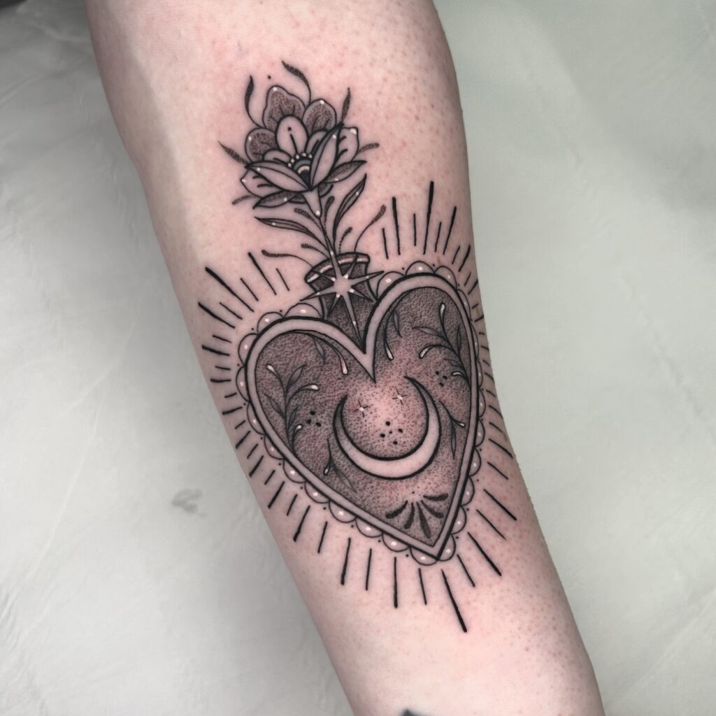 Dual Sacred Heart Tattoo with Radiating Light Tattoo Design